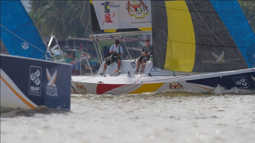 Phil Robertson crosses ahead of David Gilmour during the finals at the Asian Match Racing Championships - Photo Subzero Images,Monsoon Cup © Gareth Cooke Subzero Images/Monsoon Cup http://www.monsooncup.com.my